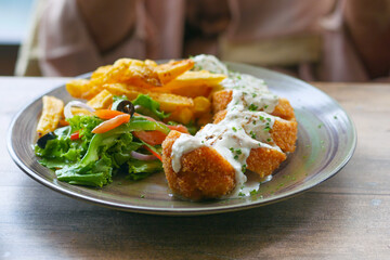 Chicken Cordon Bleu and Mayonnaise on table 