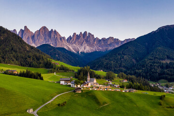 Santa Maddalena (Santa Magdalena) village with magical Dolomites mountains in background, Val di Funes valley, Trentino Alto Adige region, South Tyrol, Italy, Europe. Santa Maddalena Village, Italy.