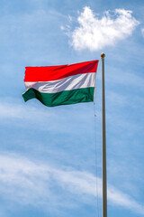 Waving hungarian flag on mast