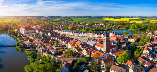 Aerial landscape of small Czech town of Telc with famous Main Square (UNESCO World Heritage Site). Aerial panorama of old town Telc, Southern Moravia, Czechia. Historic centre of Telc, Czech Republic. - obrazy, fototapety, plakaty