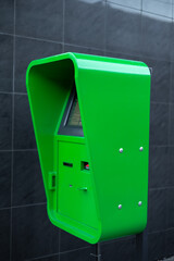 green ATM on the street