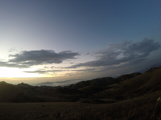 Trekking at Quiriri's Fields. Cold sunny morning, winter. Adjusting to take the sun.