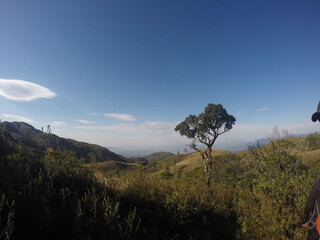 Fototapeta na wymiar Trekking at Quiriri's Fields. Cold sunny morning, winter. Adjusting to take the sun.
