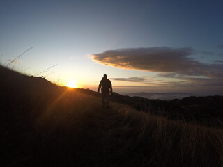 Trekking at Quiriri's Fields. Cold sunny morning, winter. Walking through the sun.
