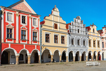 Fototapeta premium Czech town of Telc with famous Main Square (UNESCO World Heritage Site). Facade of houses on town of Telc, Southern Moravia, Czechia. Historic centre of Telc, Czech Republic.