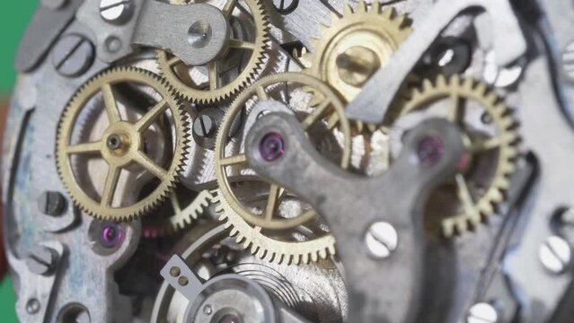 Retro watch mechanism gear motion, macro close-up