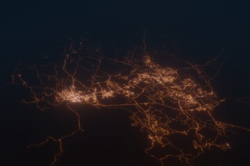 Aerial shot of Abha (Saudi Arabia) at night, view from south. Imitation of satellite view on modern city with street lights and glow effect. 3d render