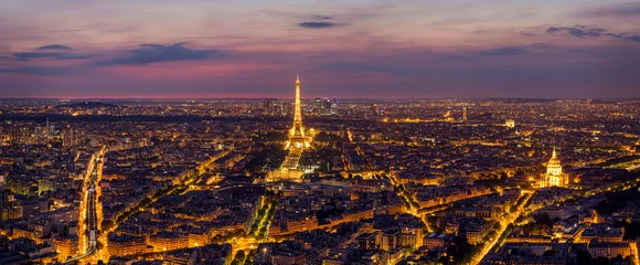 Fototapeten Paris Skyline at Night. Paris, France skyline, panorama at night. The view from Montpanasse Tower. Paris skyline by night. With illuminated city, Invalides, and arc de Triomphe. Paris, France. © daliu