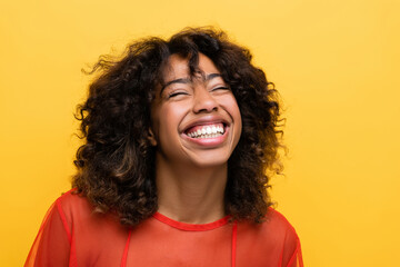 overjoyed african american woman smiling with closed eyes isolated on yellow. - Powered by Adobe
