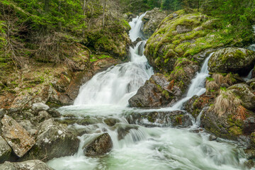 Fototapeta na wymiar The unique Bystrik Waterfall in Rila Mountain, Bulgaria