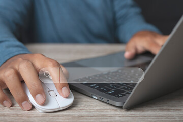 Man working with computer laptop searching browsing internet data information.