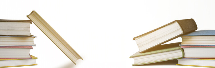 Stack of books on white background with copy space. Vintage books stack.