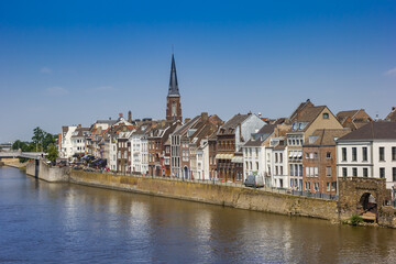 Naklejka na ściany i meble Row of historic houses at the Maas river in the Wyck area of Maastricht, Netherlands