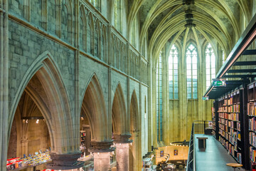 Arches of the book shop in the Dominican church in Maastricht, Netherlands - obrazy, fototapety, plakaty