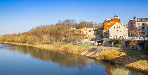 Naklejka na ściany i meble Panorama of the Saale river in the historic city of Bernburg, Germany