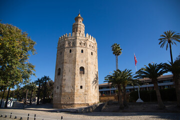 Fototapeta na wymiar Old tour in Seville, Spain. The Torre del Oro (English: 