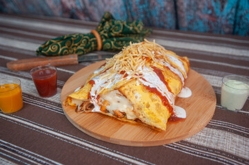 Bacon stuffed omelet