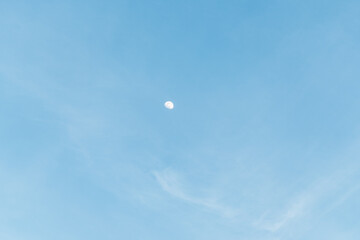 blue sky with no clouds and the moon

