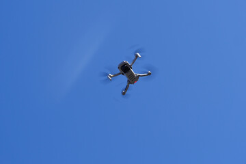 Drone protection flying during the day in blue sky, High quality photo