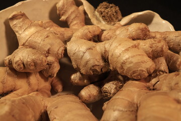 Ginger Roots on a dark background.