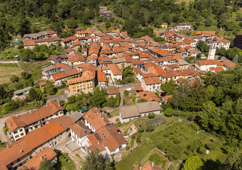 Fototapeta na wymiar Aerial view of small Italian village Cassano Valcuvia at spring time, situated in province of Varese, Lombardy, Italy