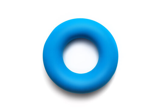Isolated blue hand gripper or espander for exercising in fitness and strength