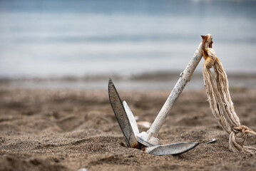 Anchor in the sand on the beach