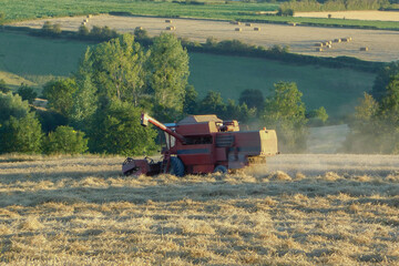 combine harvester working in a field