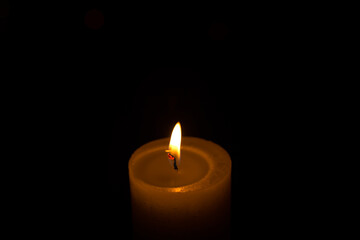 Warm candlelight on a dark mysterious background