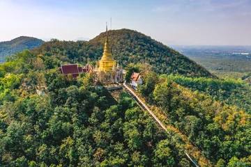 Fotobehang Aerial view of Wat Phra Phutthabat Tak Pha temple on top of the mountain in Lamphun, Thailand © pierrick
