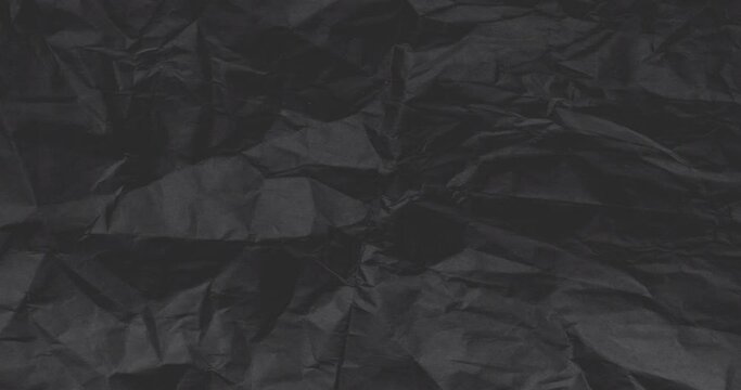 Abstract stop motion background with crumpled paper. Creative looped background for text, presentations, screensavers. 4K video.