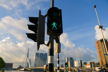 Pedestrian traffic sign. The green light is showing that pedestrians are allowed to cross the...