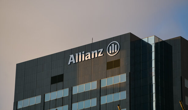 The logo sign of Allianz banking finance company on the headquarters modern office building from Rotterdam. Bank industry. Netherlands, 2022.