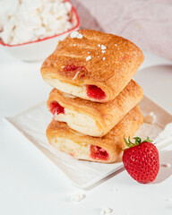 homemade puff pastry with cottage cheese and strawberries