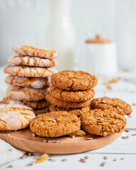 cereal cookies on wooden board with sunflower seeds on the table