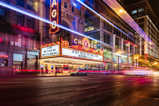 CHICAGO, IL, USA - November 3, 2018: The iconic Chicago Theatre on a cold winter night with a long exposure of vehicles passing by on State Street.
