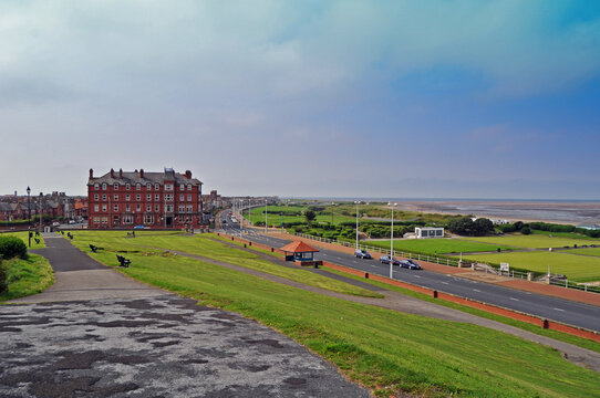 A panorama of the promenade of the seaside resort of Fleetwood Lancashire uk with the Mount hotel and the sea in the background.