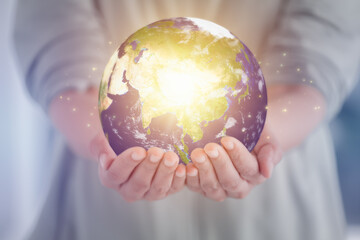 Earth in hands. Continents of Asia. Save of earth. Environment concept. Earth day. Saving world....