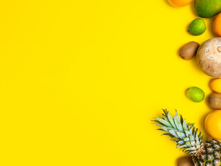 Summer poster. Summer juicy fruits on a yellow background.