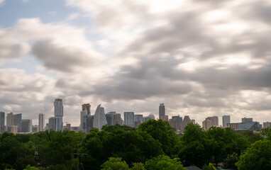 Fototapeta na wymiar Long Exposure of Clouds Over Downtown Austin Skyline