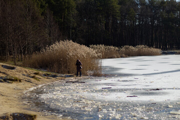 person waalkin on the fosen lake 