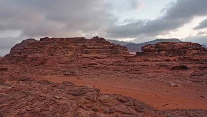 Rocky scenery in Wadi Rum desert during overcast morning