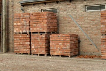 Pallets of bricks for building. Concept of building materials