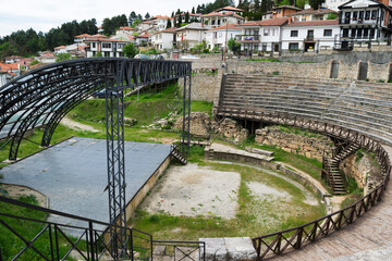 Naklejka premium Ancient greek antique amphitheater or ancient theater of Ohrid overlooking the old town of Ohrid and Lake Ohrid in North Macedonia