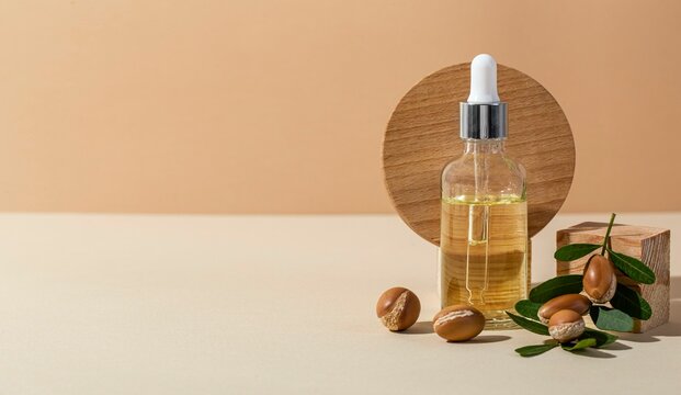 minimal background of argan oil care composition