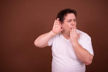Funny man eavesdrops on other people's conversations.