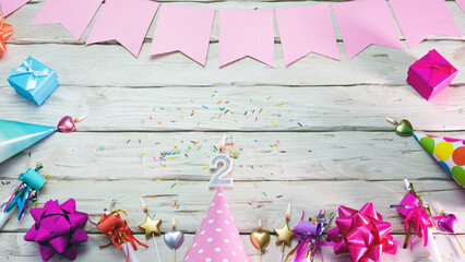 Happy birthday number 2. Copyspace. Beautiful card in pastel pink colors for a woman or a girl....