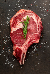 raw beef steak on stone background