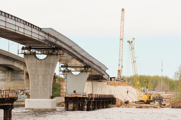 Fototapeta na wymiar Construction of a new bridge next to the old one.