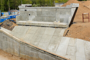 Retaining wall under reinforced concrete structure.